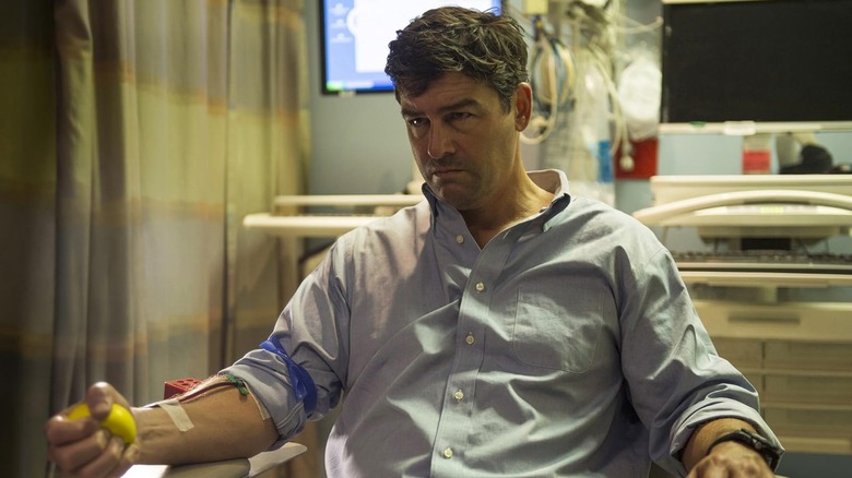 Kyle Chandler as John Rayburn getting blood drawn in Bloodline