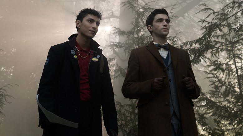 Edwin Payne and Charles Rowland walk in the woods in Dead Detectives.