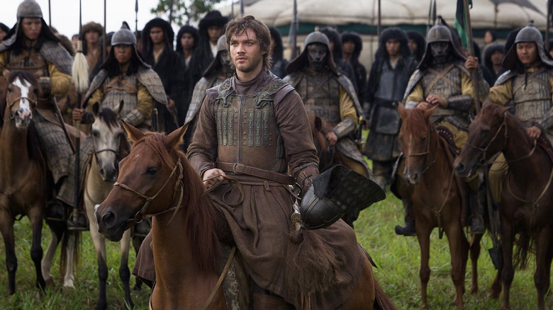Marco Polo rides his horse at the head of the Mongol army in 