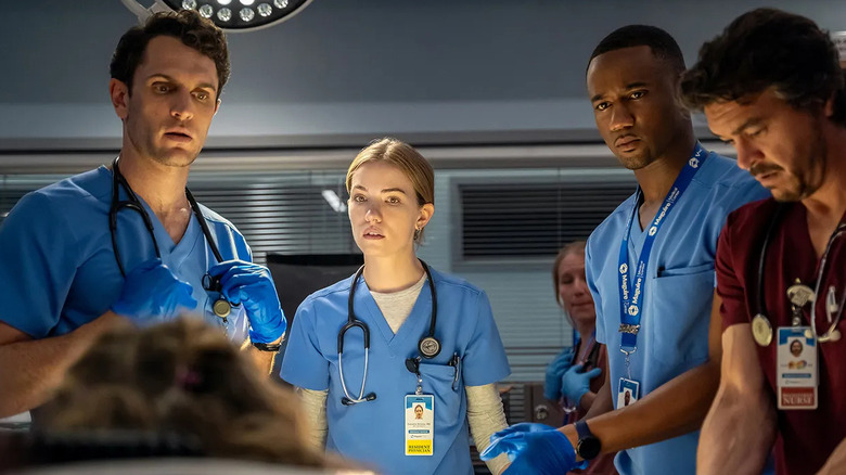 The hospital staff looking alarmed on Pulse