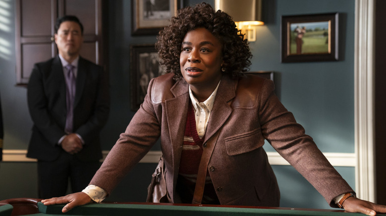 Uzo Aduba as Cordelia Cupp leaning on a pool table on The Residence