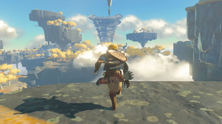 Link running off a sky island with his back to the camera in The Legend of Zelda: Tears of the Kingdom