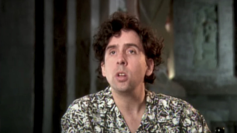 Tim Burton speaks during an interview on the Batman Returns set