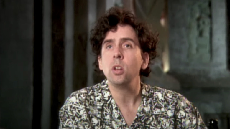 Tim Burton speaks during an interview on the Batman Returns set