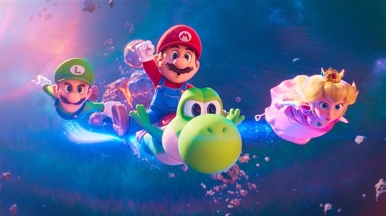 Mario flying around the galaxy while riding Yoshi, accompanied by Peach and Luigi in The Super Mario Galaxy Movie
