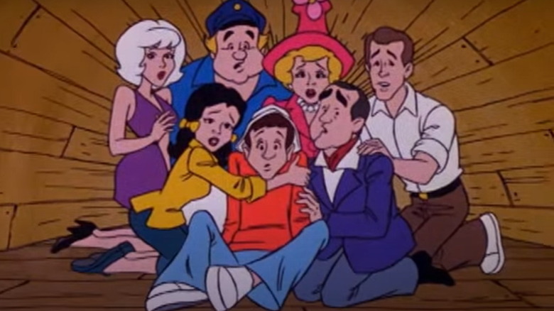 Passenger and Minnow crew around Gilligan, and look afraid, on the planet Gilligan