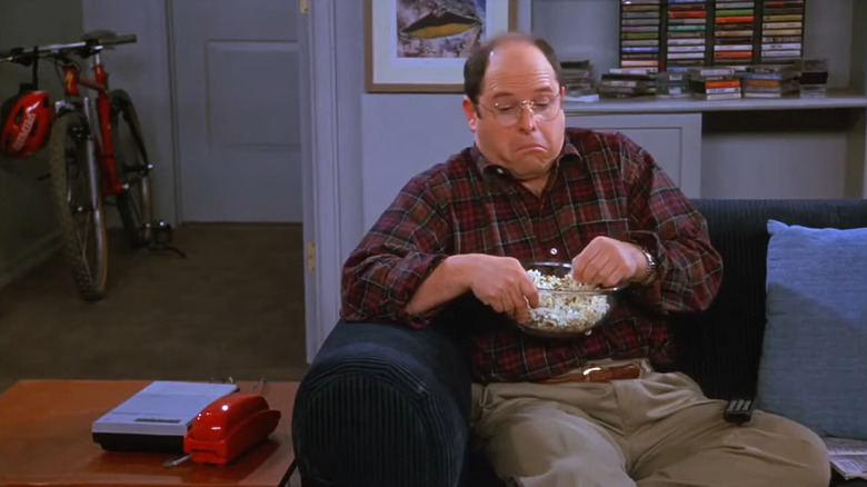 George Costanza listening to his telephone message in Seinfeld