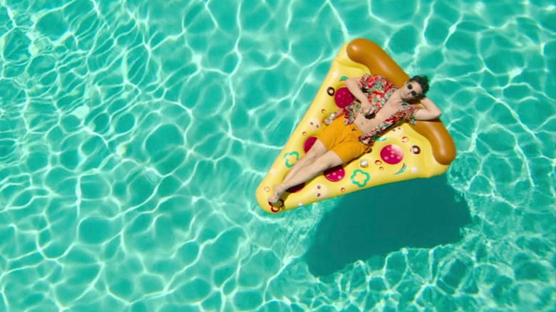 Andy Samberg on pool float Palm Springs