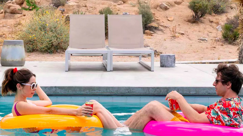 Cristin Milioti Andy Samberg in pool Palm Springs