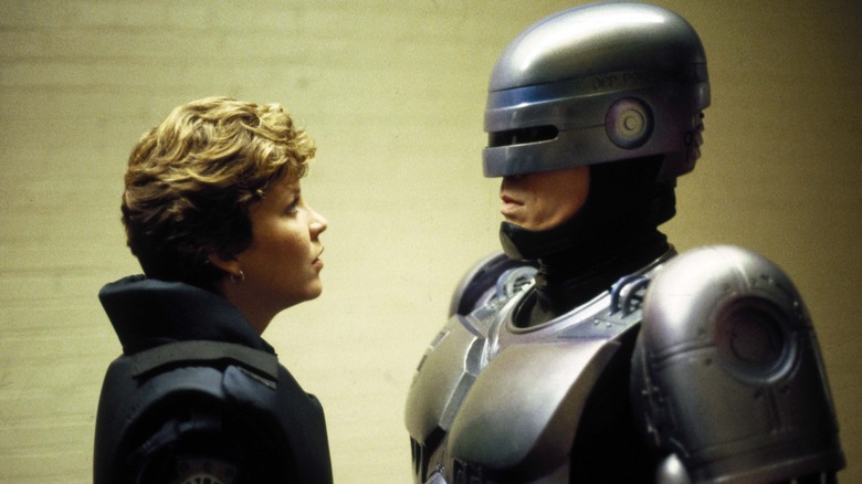 RoboCop talking to Officer Anne Lewis in RoboCop