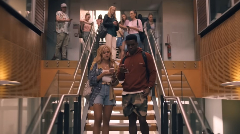 Students gathered on the stairs on One of Us Is Lying