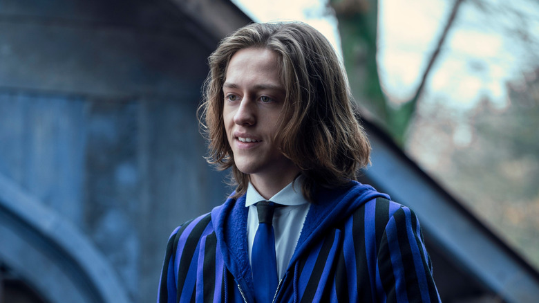 Percy Hynes White's Xavier Thorpe wearing a striped school uniform on Wednesday