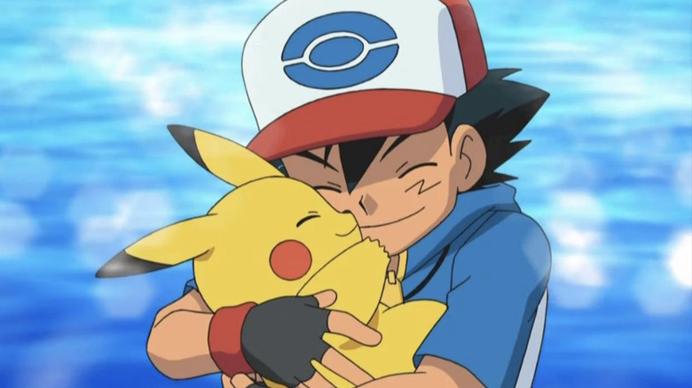 Ash hugs Pikachu in Pokémon