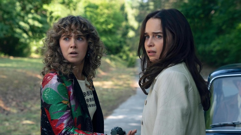 Haley Lu Richardson as Twila Hasbeck and Emilia Clarke as Beatrice "Bea" Grant looking shocked in Ponies