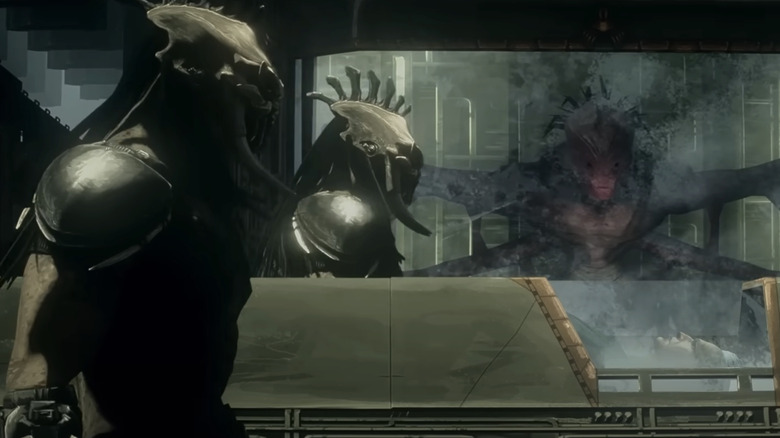 Two Yautja escorting the body of Ursa frozen in a chamber at the end of Predator: Killer of Killers