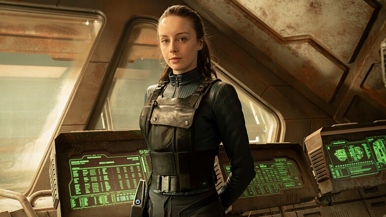 Kacey Rohl's Rachel posed next to out-of-date monitor systems in a promotional photo from Star Trek: Section 31