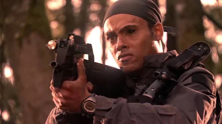 A gun-toting Rainbow Sun Francks is afflicted with Wraith feeding as Aiden Ford in Stargate Atlantis