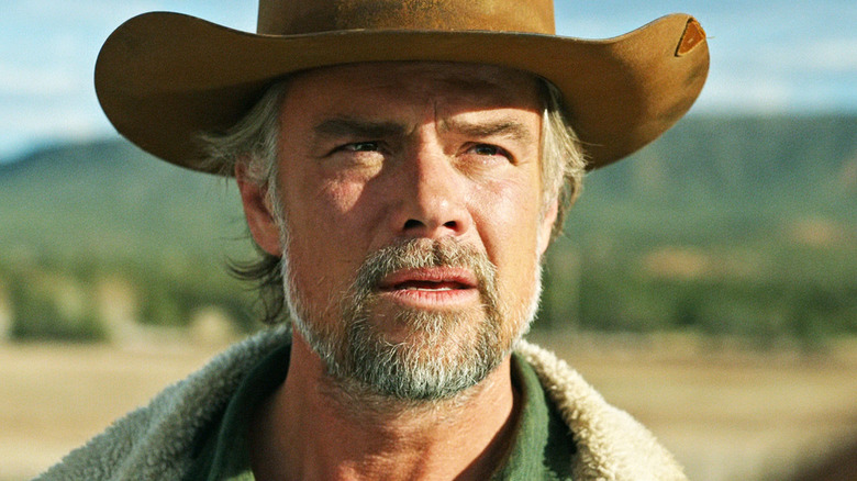 Josh Duhamel's Staten Kirkland is seen in closeup as he stands outside in Ransom Canyon
