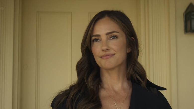 Minka Kelly's Quinn O'Grady stands on her porch in Ransom Canyon