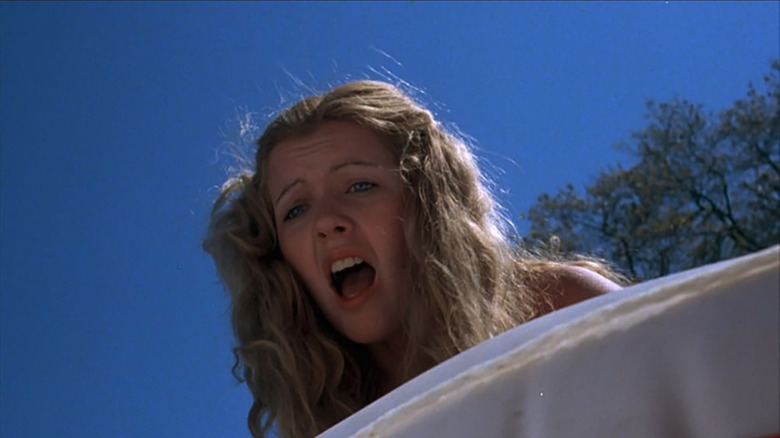 Janie Squire as Barbara Randolph looking terrified in Piranha