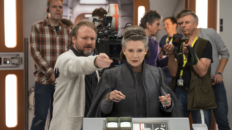Director Rian Johnson giving instructions to Carrie Fisher as Leia Organa on the set of Star Wars: The Last Jedi