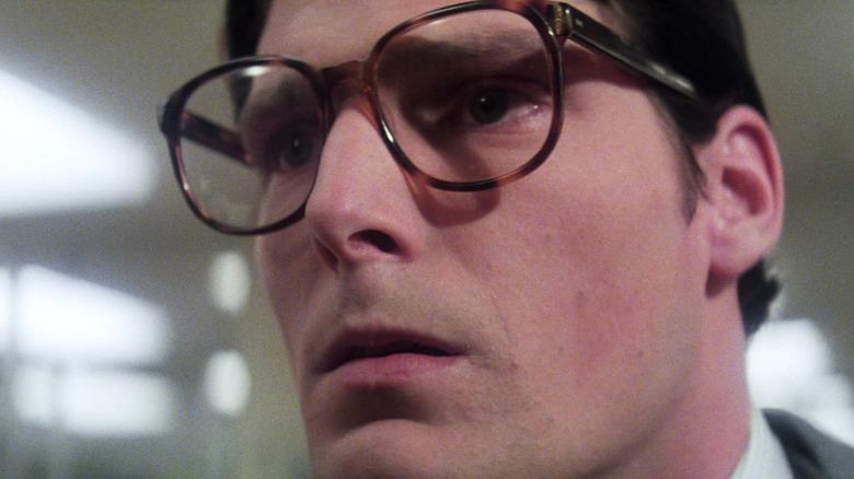 Christopher Reeve's Clark Kent is seen in cloeup as he sits in a newsroom in Superman