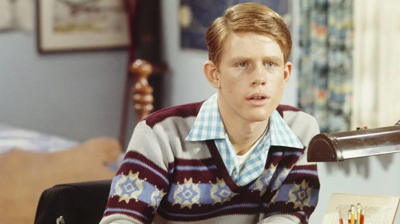Ron Howard is studying hard as Richie Cunningham in Happy Days