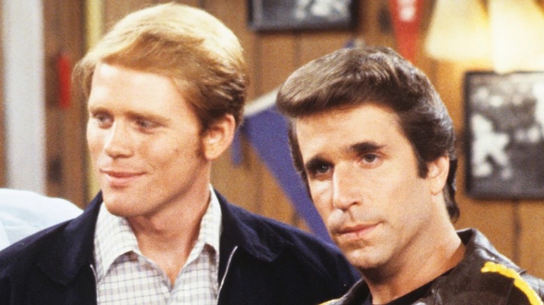 Ron Howard as Richie Cunningham and Henry Winkler as Arthur "Fonzie" Fonzarelli hang out at Arnold's in Happy Days