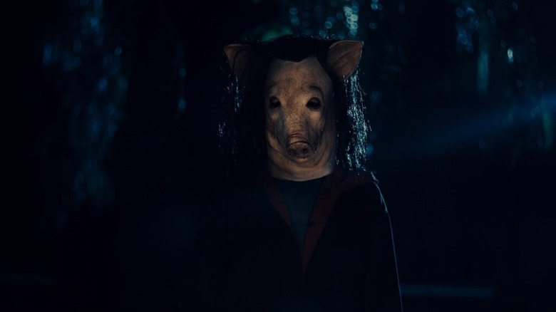 Soneone in a pig mask in Saw X
