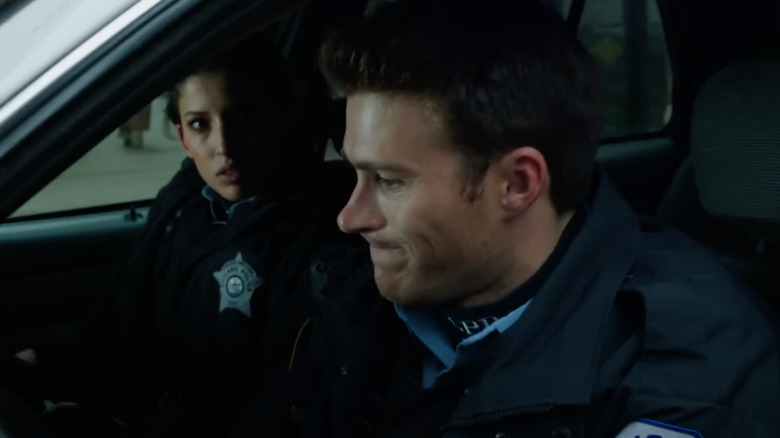 Scott Eastwood as Officer Jim Barnes starting his car on Chicago Fire