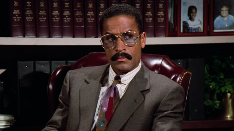 Jackie Chiles looking over at Kramer in Seinfeld