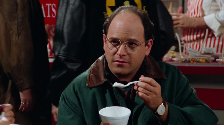 George Costanza eating yogurt in Seinfeld