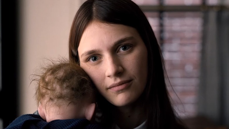 Leanne holds baby doll