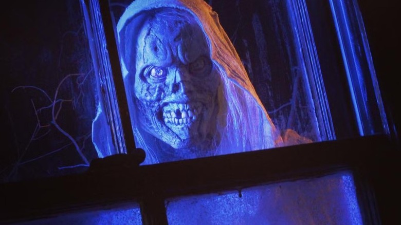 The Creep peeking through a window on Creepshow