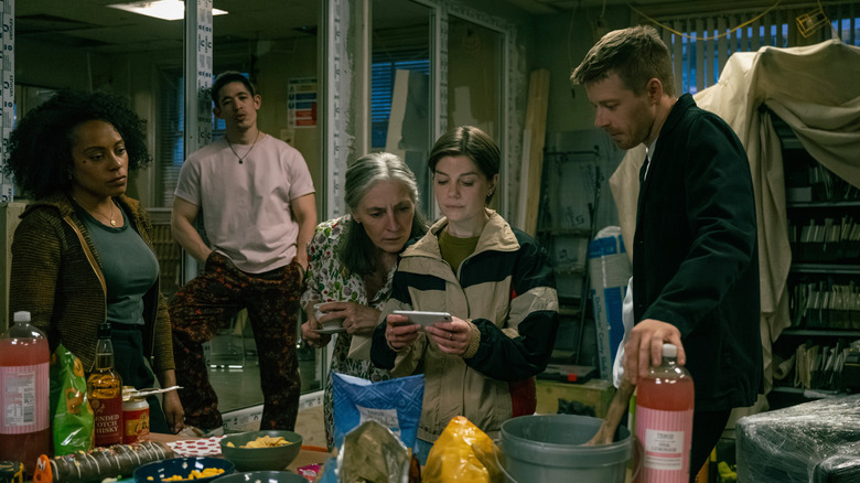 Rosalind Eleazar's Louisa Guy, Christopher Chung's Roddy Ho, Saskia Reeves' Catherine Standish, Aimee-Ffion Edwards' Shirley Dander and Jack Lowden's River Cartwright stand in their office in Slow Horses