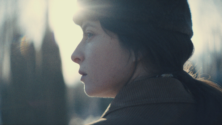 A young Irina Morozova looking over her shoulder in Star City