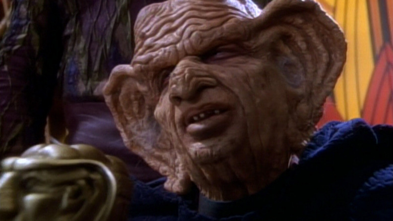 The Grand Nagus with a scepter in Star Trek: Deep Space Nine