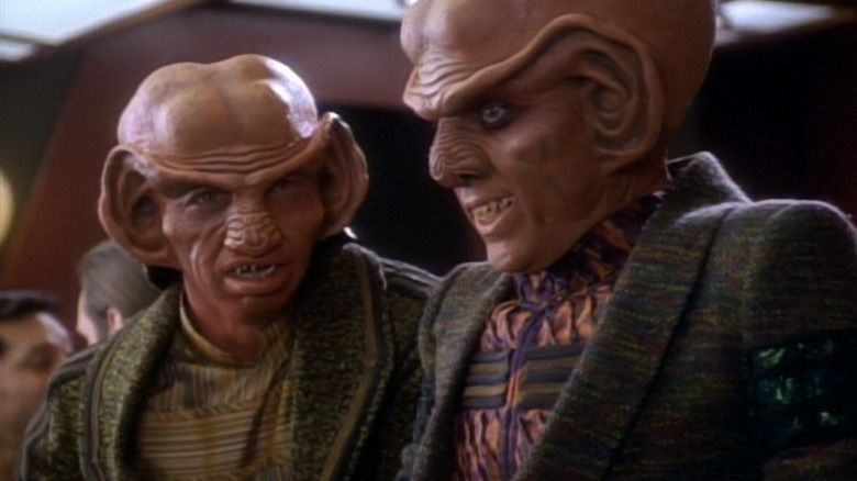 Rom standing next to Quark on Star Trek: Deep Space Nine