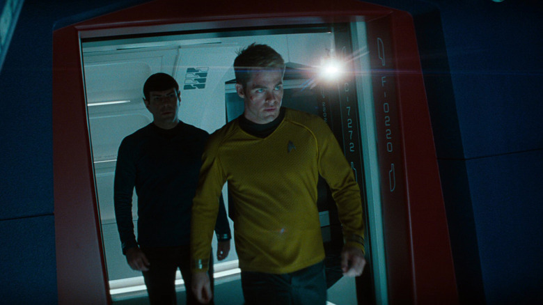 Zachary Quinto as Spock and Chris Pine as Kirk walking through a set of doors in Star Trek Into Darkness