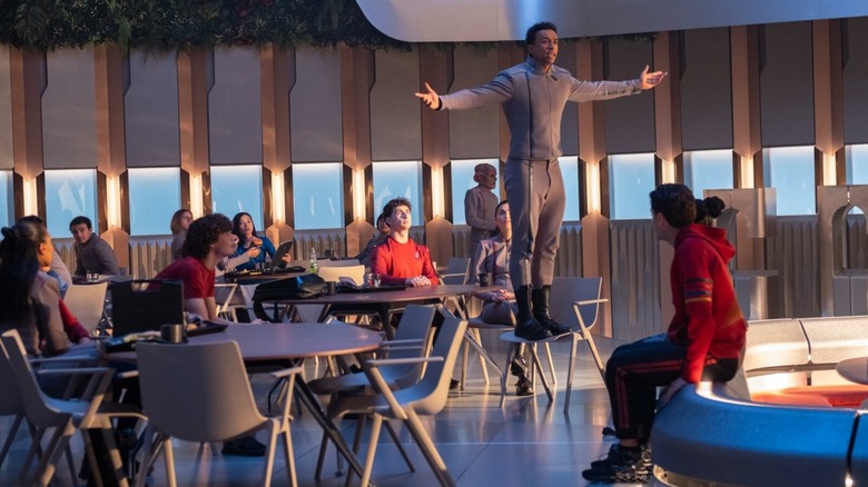 Caleb Mir standing on his desk during a lecture in Star Trek: Starfleet Academy