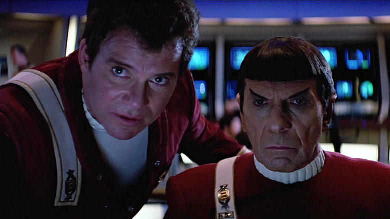Captain Kirk and Spock looking concerned in Star Trek V: The Final Frontier