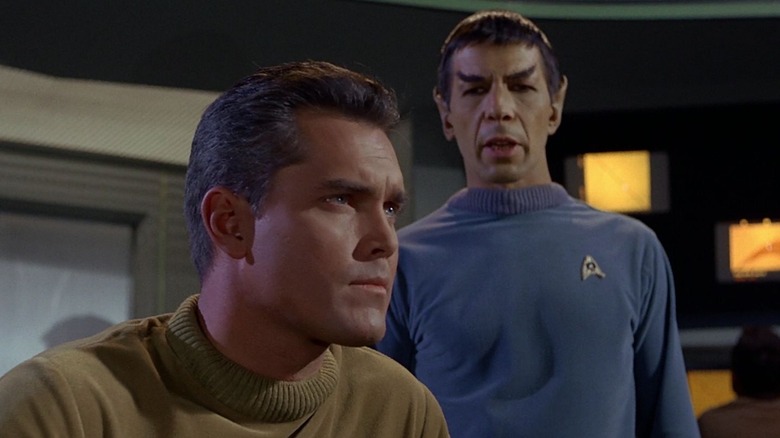 Captain Pike on the bridge of the Enterprise with Spock on Star Trek