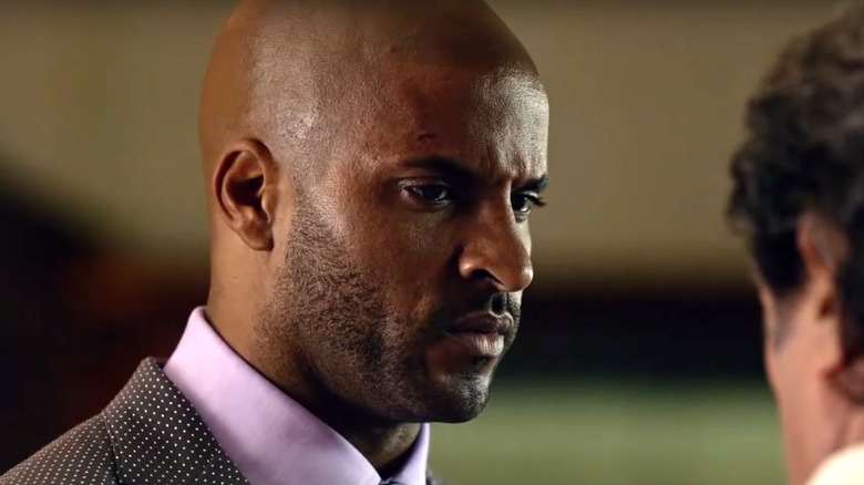 Shadow talking to Wednesday on American Gods