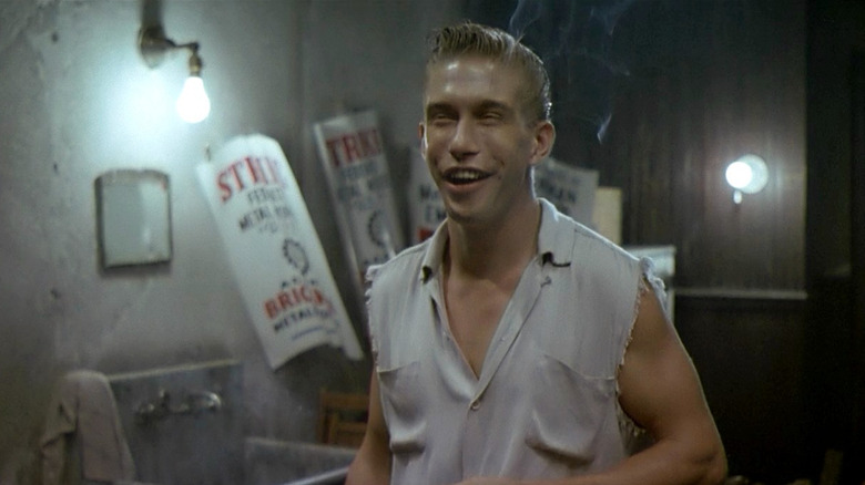 Stephen Baldwin grinning as Sal in Last Exit to Brooklyn