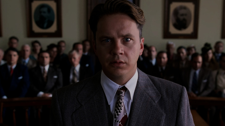 Andy Dufresne looking worried in court in The Shawshank Redemption