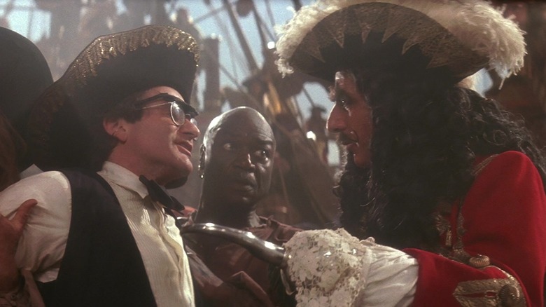 Robin Williams as Peter Banning facing off with Dustin Hoffman as Captain James Hook in Hook