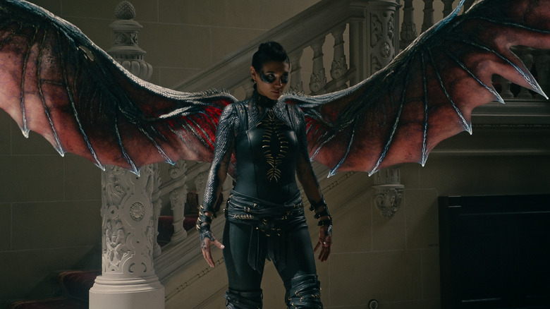 Lorena Andrea standing with demonic wings in Warrior Nun