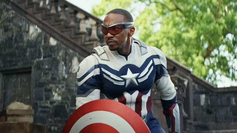 Anthony Mackie's Sam Wilson crouched down holding his shield in Captain America: Brave New World