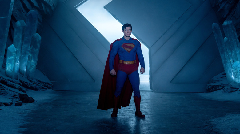 David Corenswet as Superman striking a dramatic pose in the Fortress of Solitude in James Gunn's Superman