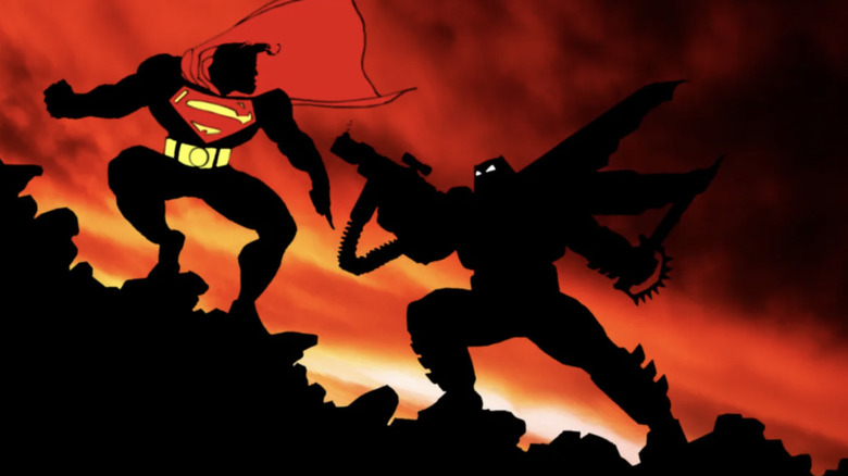 Superman and Batman fighting each other in shadow on the Dark Knight Returns #4 cover